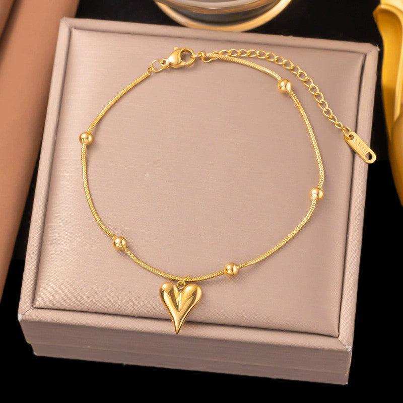 Gold Plated Heart Themed Jewellery set with Chain, Earrings and Bracelet