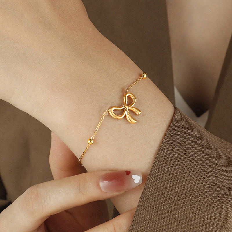 Gold Plated Infinite Bow Themed Jewellery set with chain,Earrings,Bracelet