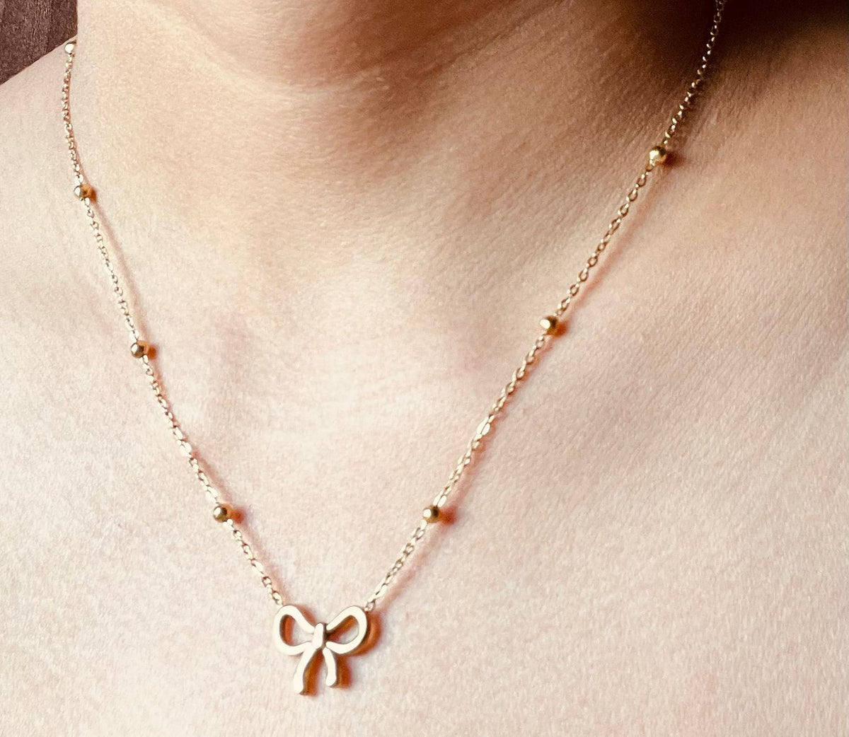Gold Plated Infinite Bow Themed Jewellery set with chain,Earrings,Bracelet